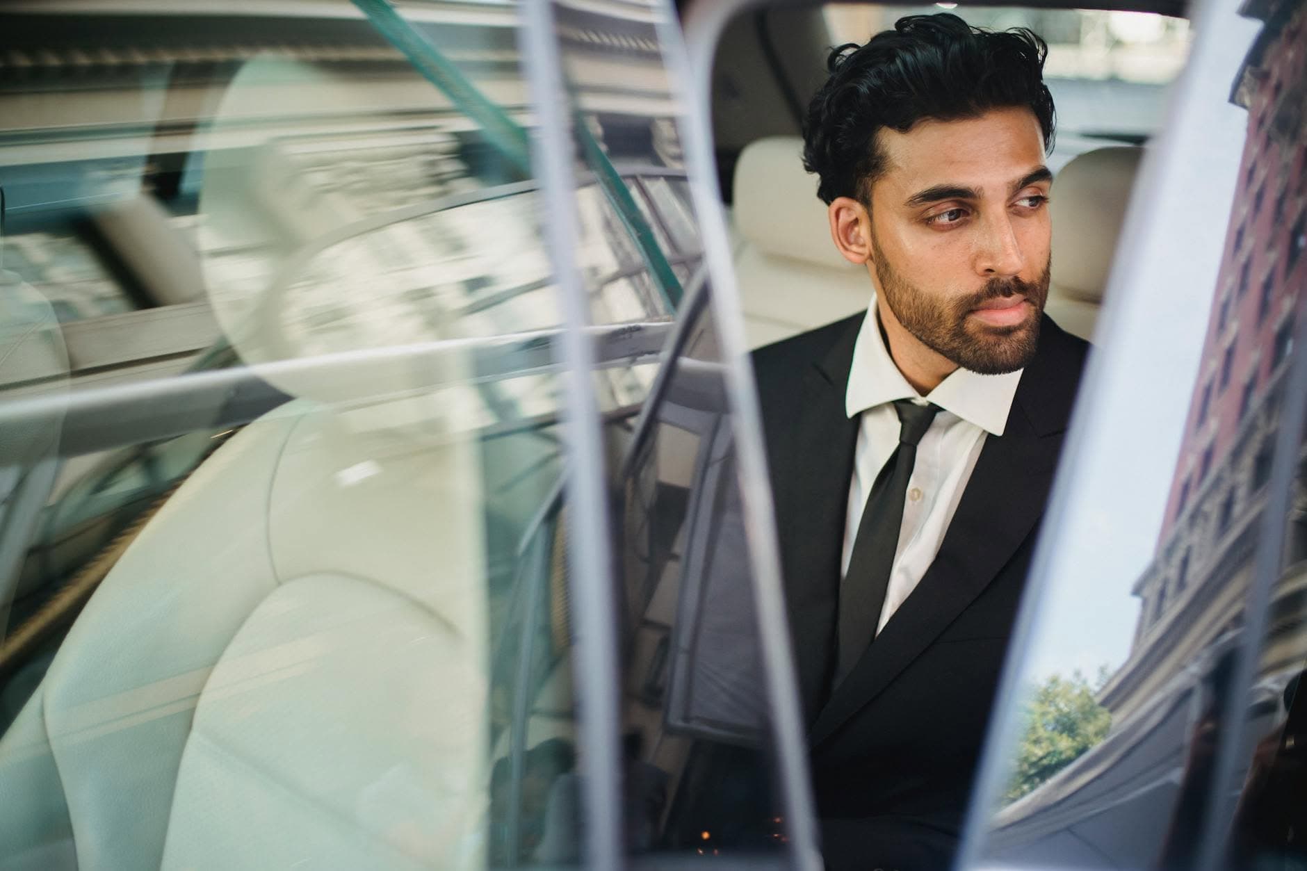 Professional executive in luxury car â€” Volantis chauffeur service Elmhurst IL